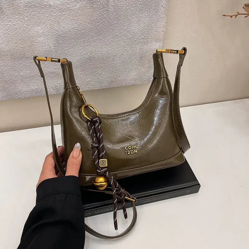 Black Leather Shoulder Bag with Gold Plated Handles - Image 6