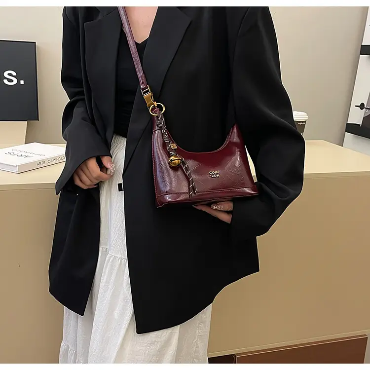 Black Leather Shoulder Bag with Gold Plated Handles — feature 10