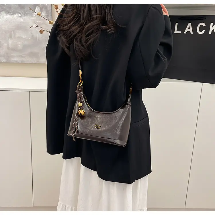 Black Leather Shoulder Bag with Gold Plated Handles — feature 13