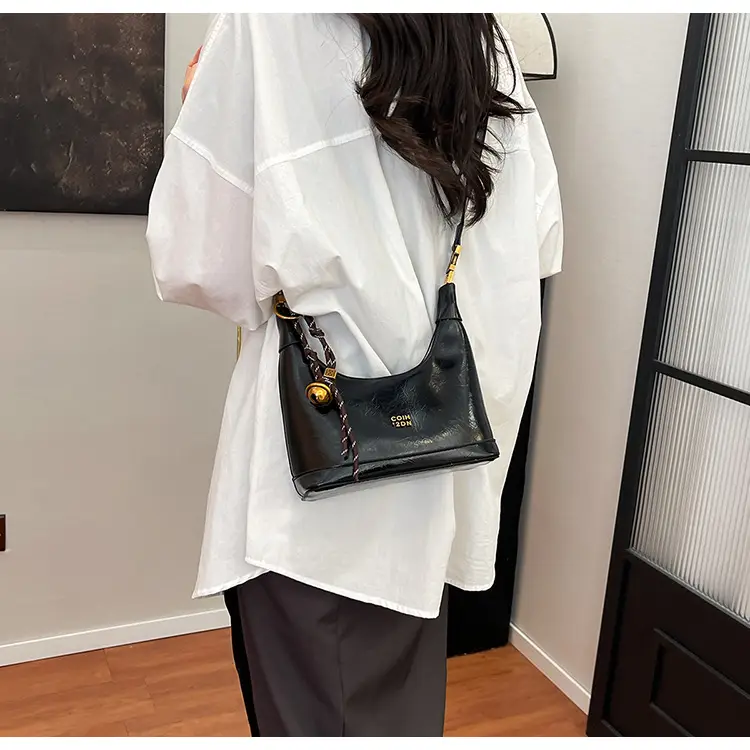 Black Leather Shoulder Bag with Gold Plated Handles — feature 16