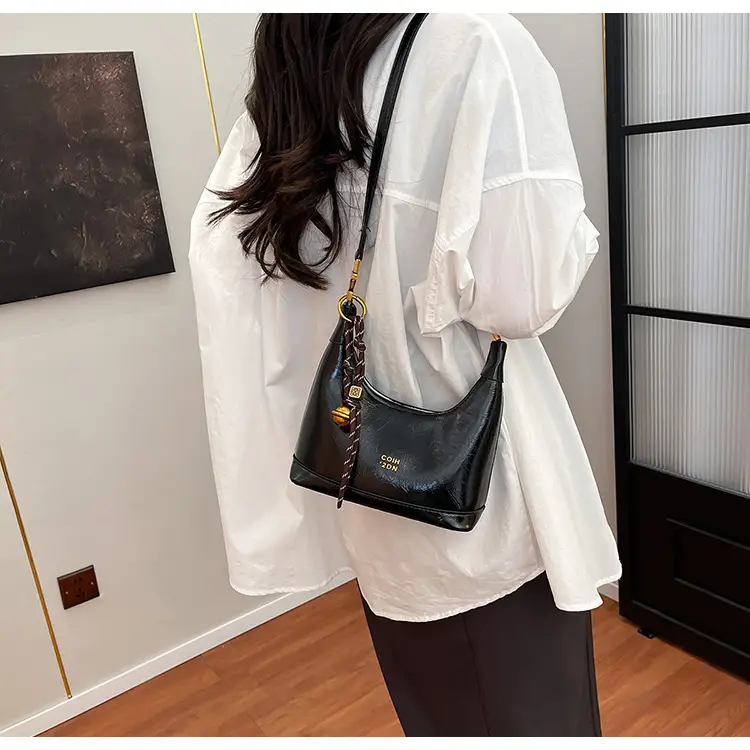 Black Leather Shoulder Bag with Gold Plated Handles — feature 17