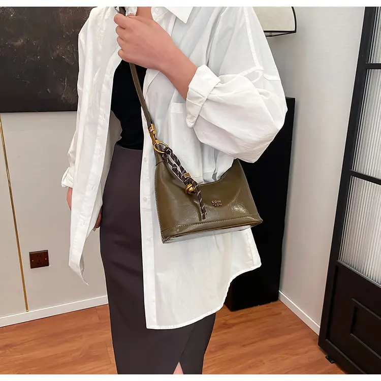 Black Leather Shoulder Bag with Gold Plated Handles — feature 18
