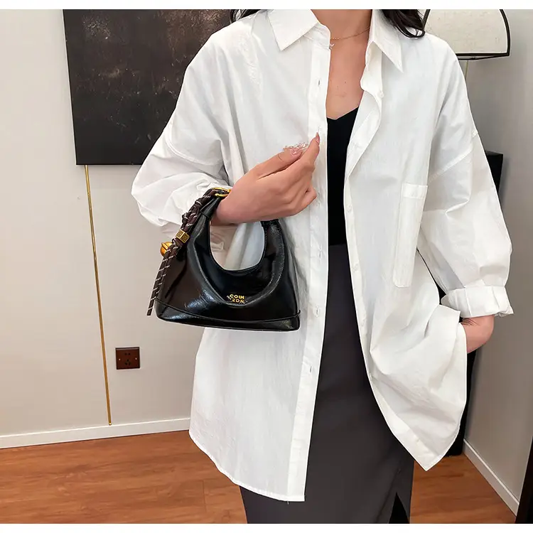Black Leather Shoulder Bag with Gold Plated Handles — feature 20