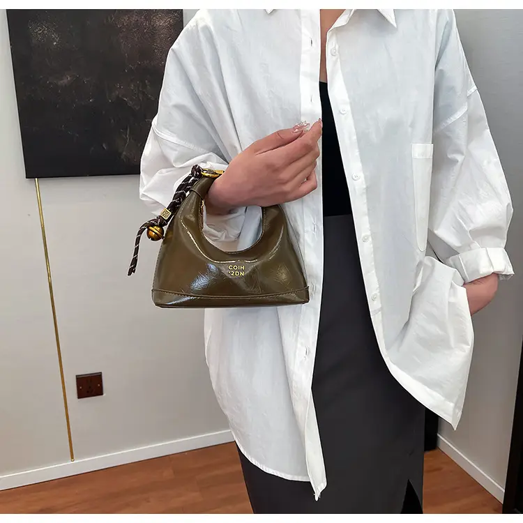 Black Leather Shoulder Bag with Gold Plated Handles — feature 21