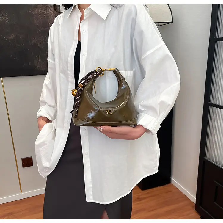 Black Leather Shoulder Bag with Gold Plated Handles — feature 22