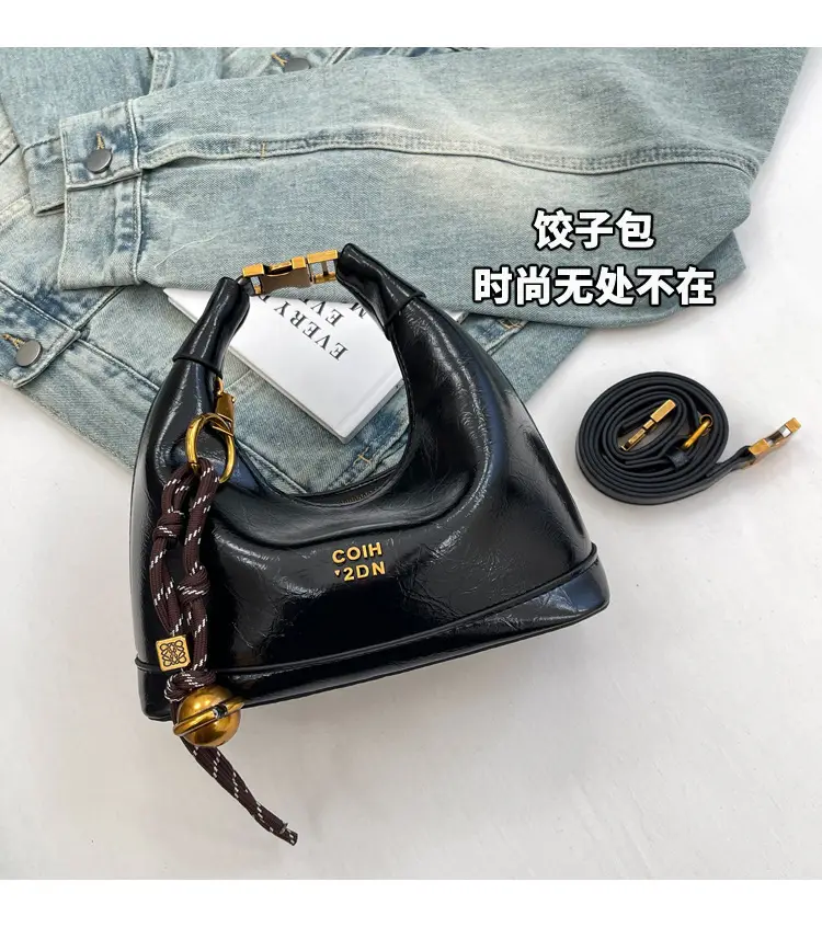 Black Leather Shoulder Bag with Gold Plated Handles — feature 3