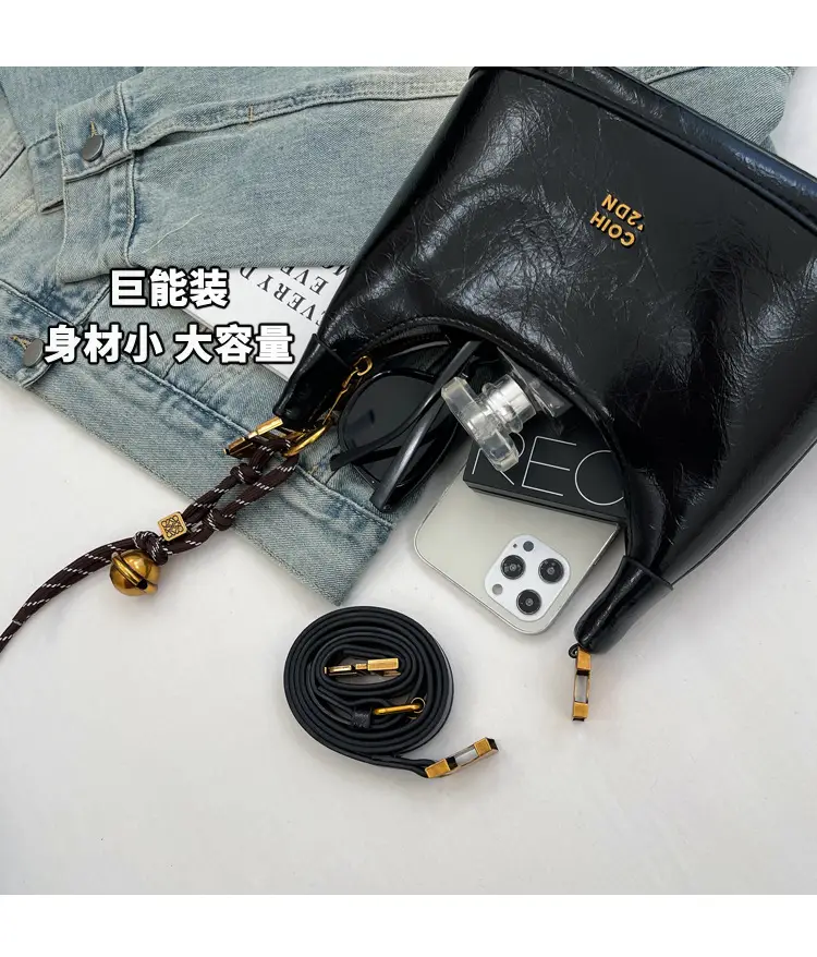 Black Leather Shoulder Bag with Gold Plated Handles — feature 7