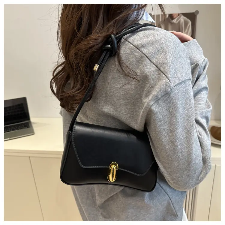 White Minimalist Shoulder Bag with Gold Clasp — feature 13