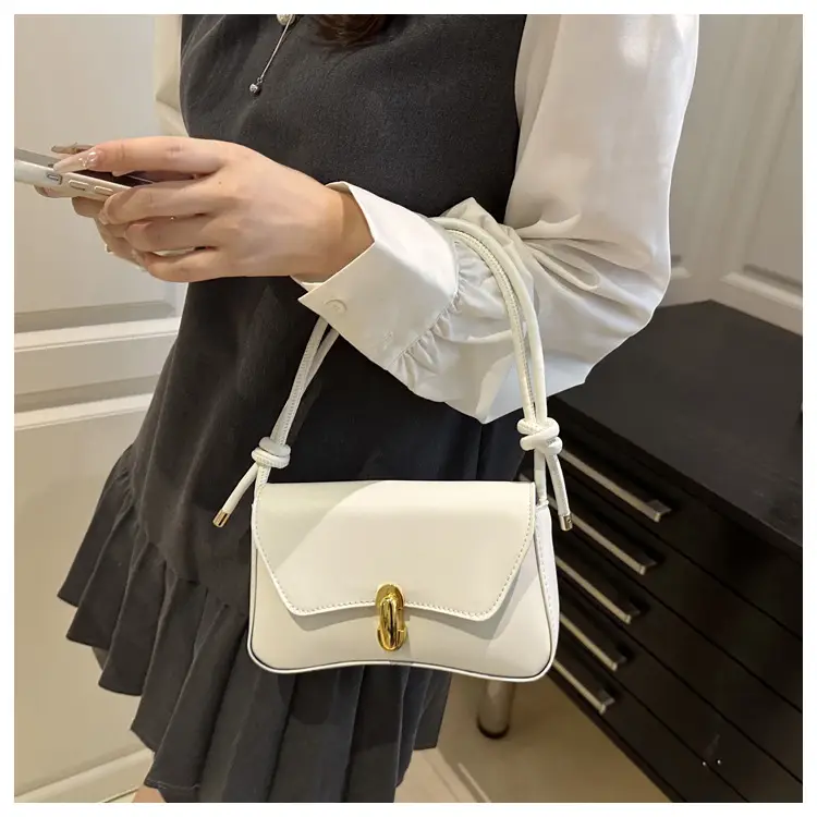 White Minimalist Shoulder Bag with Gold Clasp — feature 9