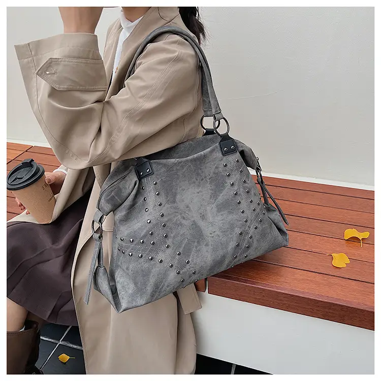 Large Capacity Rivet Handbag Brown Leather — feature 34
