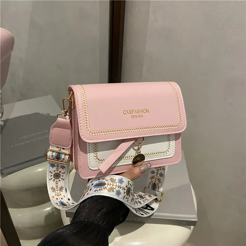 Minimalist Crossbody Bag with Wide Strap & Textured Strap - Image 6