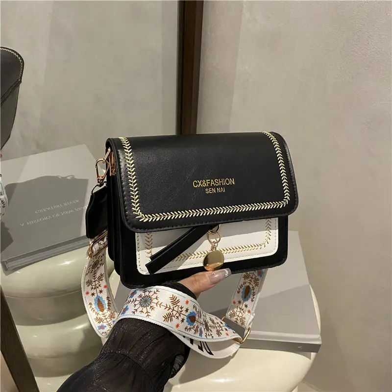 Minimalist Crossbody Bag with Wide Strap & Textured Strap - Image 7