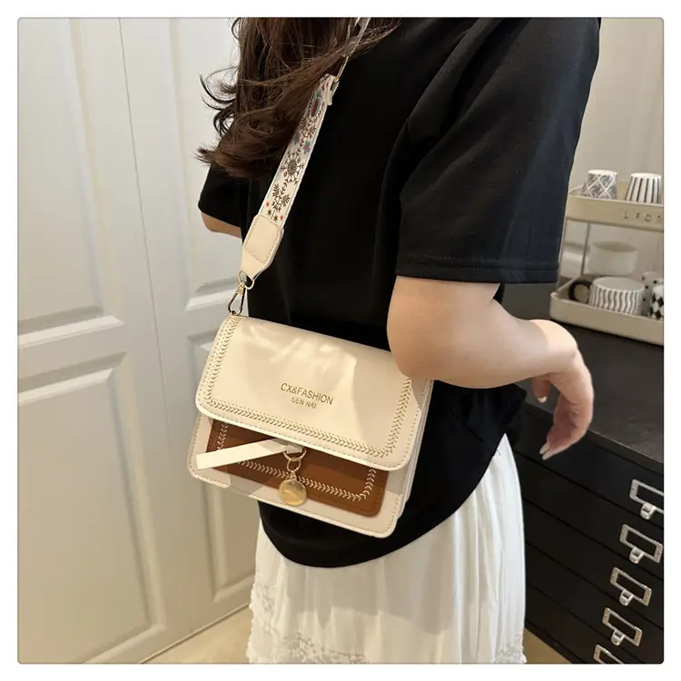 Minimalist Crossbody Bag with Wide Strap & Textured Strap — feature 11