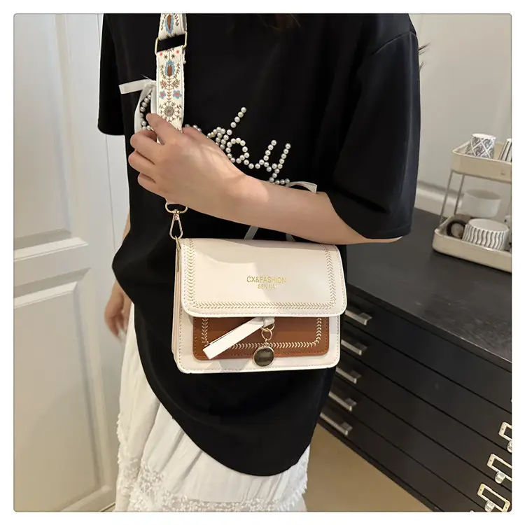 Minimalist Crossbody Bag with Wide Strap & Textured Strap — feature 12