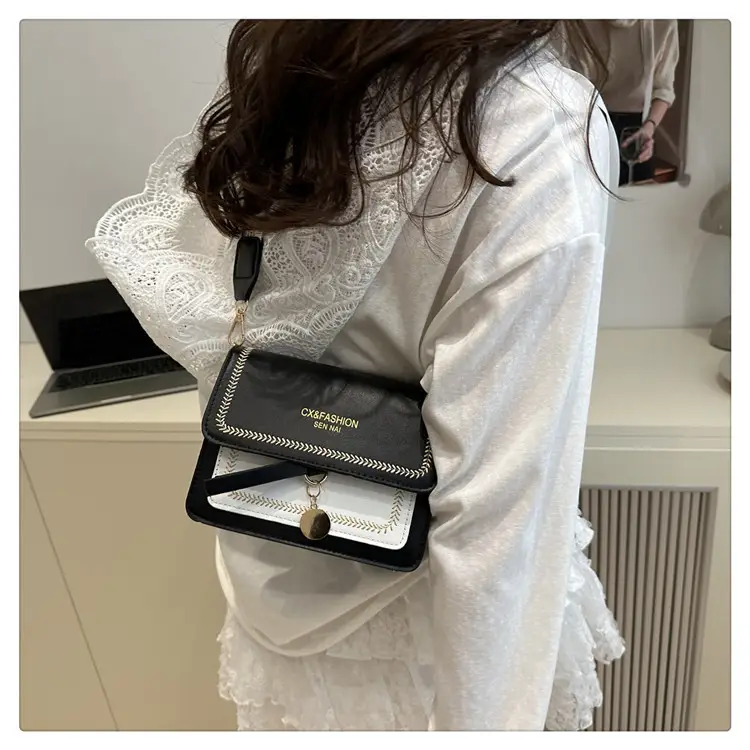 Minimalist Crossbody Bag with Wide Strap & Textured Strap — feature 18
