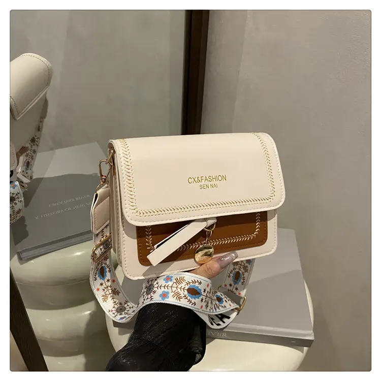 Minimalist Crossbody Bag with Wide Strap & Textured Strap — feature 19