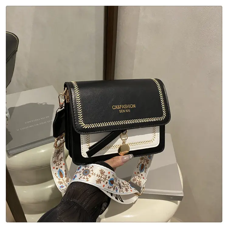 Minimalist Crossbody Bag with Wide Strap & Textured Strap — feature 21
