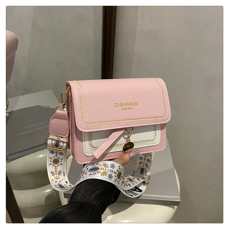 Minimalist Crossbody Bag with Wide Strap & Textured Strap — feature 22