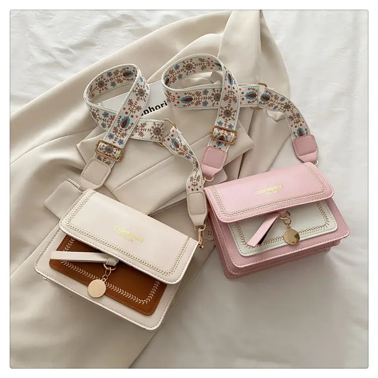 Minimalist Crossbody Bag with Wide Strap & Textured Strap — feature 23