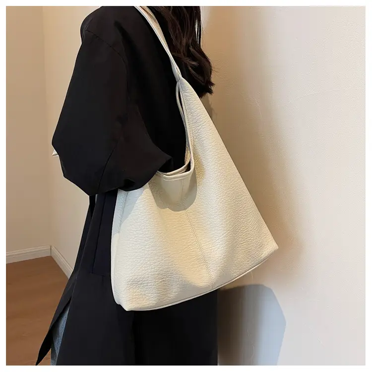 Stylish Underarm Bag with Large Capacity, Hand-Held, Leather Material — feature 17