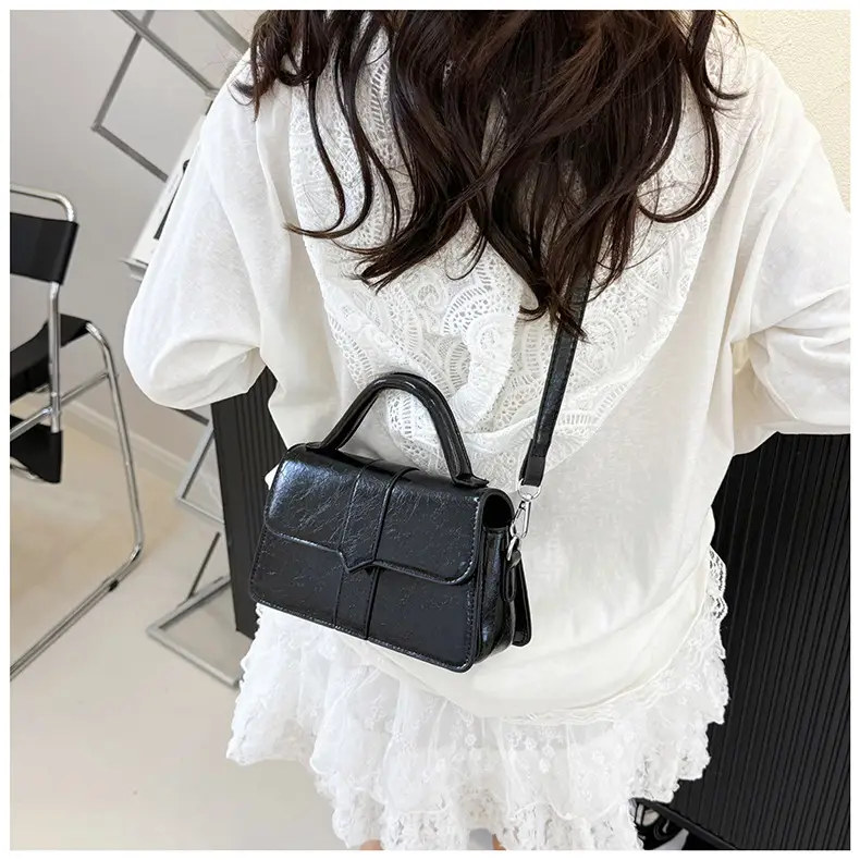 Black Square Crossbody Bag with Yellow Strap — feature 18