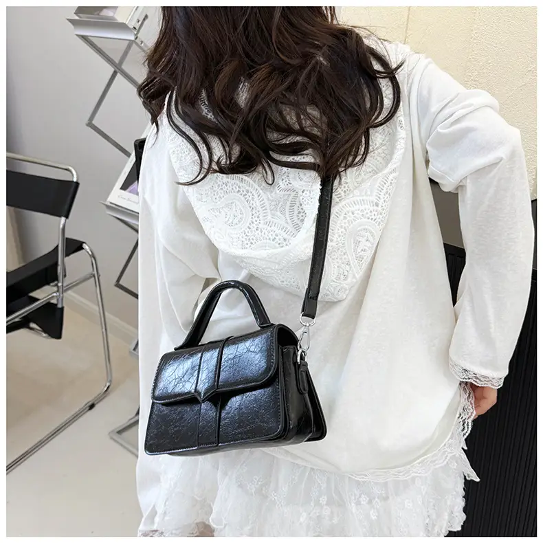 Black Square Crossbody Bag with Yellow Strap — feature 19