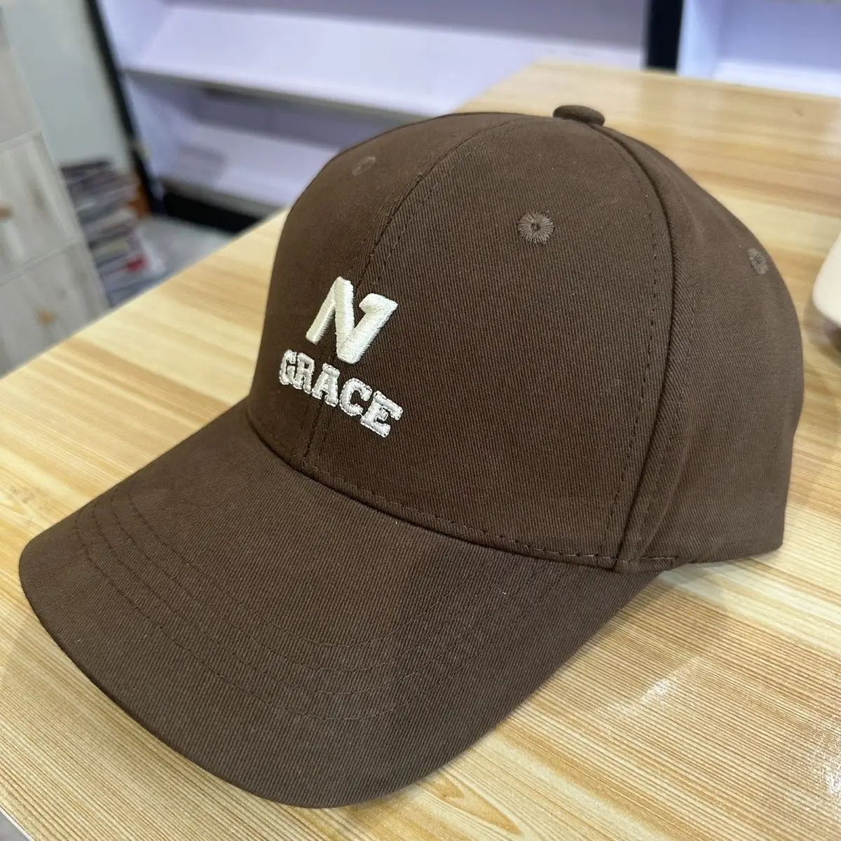 Women Sunshade Cap with Embroidered N Logo — feature 7