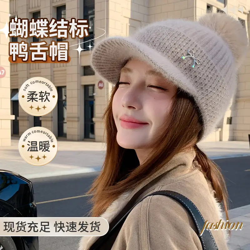 White Knitted Peaked Cap with Pom Pom & Bow Knot - Image 4