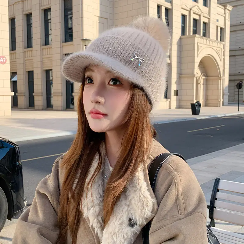White Knitted Peaked Cap with Pom Pom & Bow Knot - Image 7