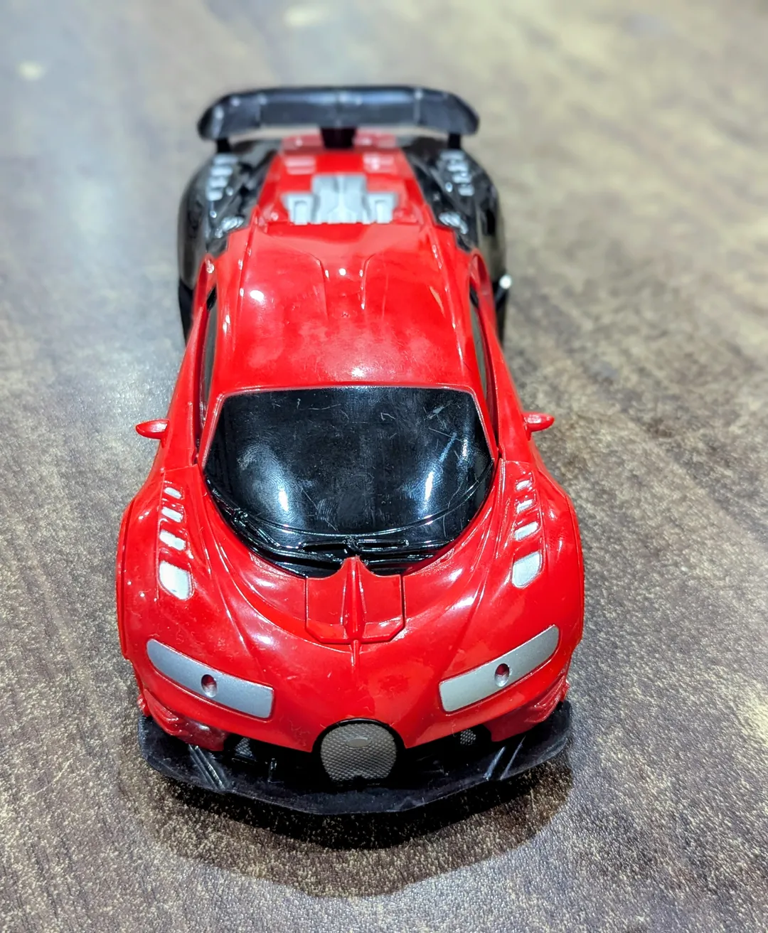 AUTOBOTS 1:18 SCALE RC TRANSFORMER CAR — ONE-KEY DEFORM ROBOT WITH LED LIGHTS & REMOTE CONTROL