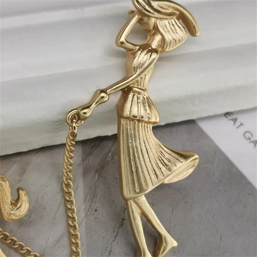 Matte Gold Dog Walking Brooch for Women