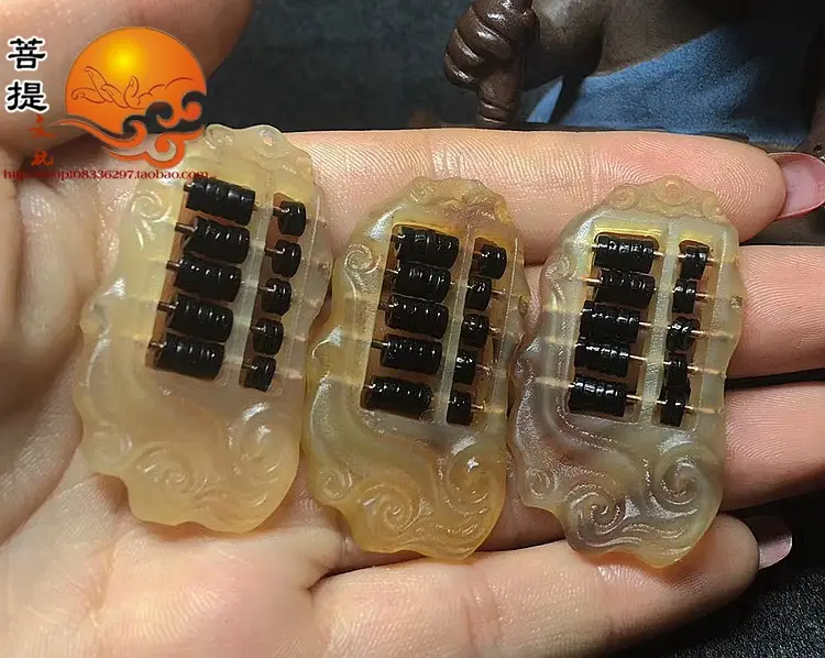 Carved Ram Horn Abacus Pendant with Golden Beads