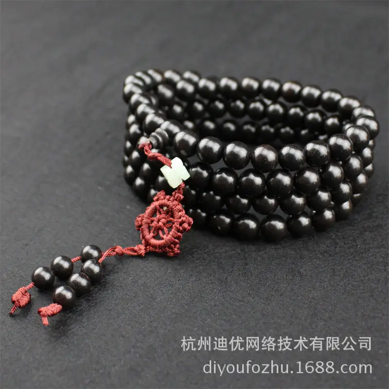 Elegant Multi-Layer Ebony Rosary Bracelet with Red Tassel