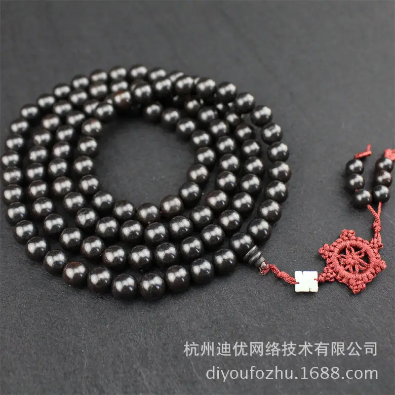 Elegant Multi-Layer Ebony Rosary Bracelet with Red Tassel