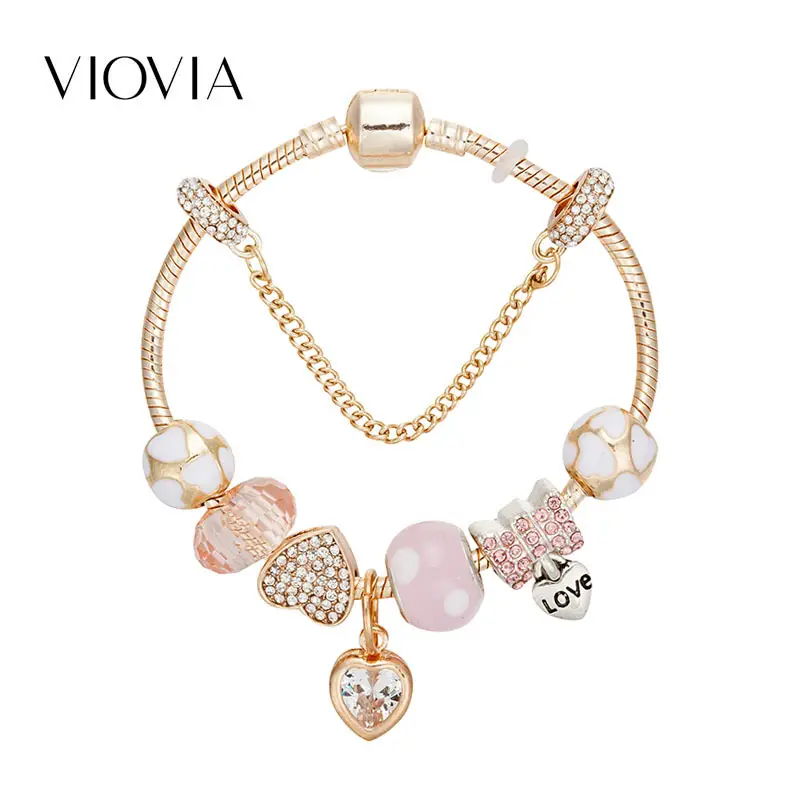 Gold Toned Bracelet with Peach Hearts & Diamond Accents