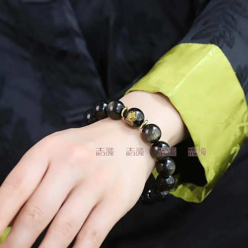 Black Obsidian Bracelet with Gold Accents & Spiritual Design