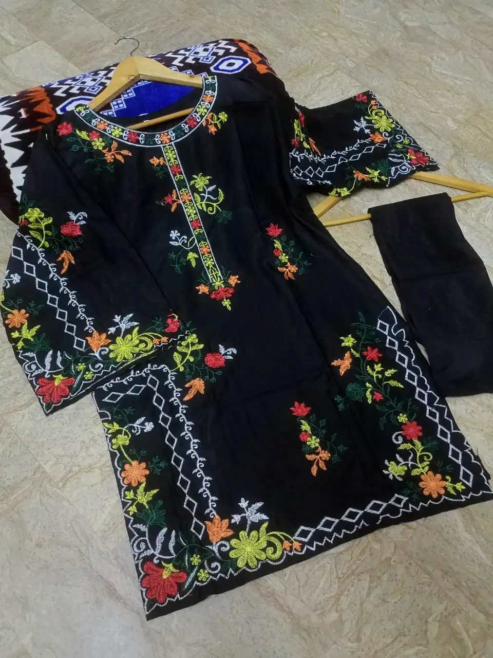 2 Pcs Women's Stitched Linen Embroidered Shirt And Trouser
