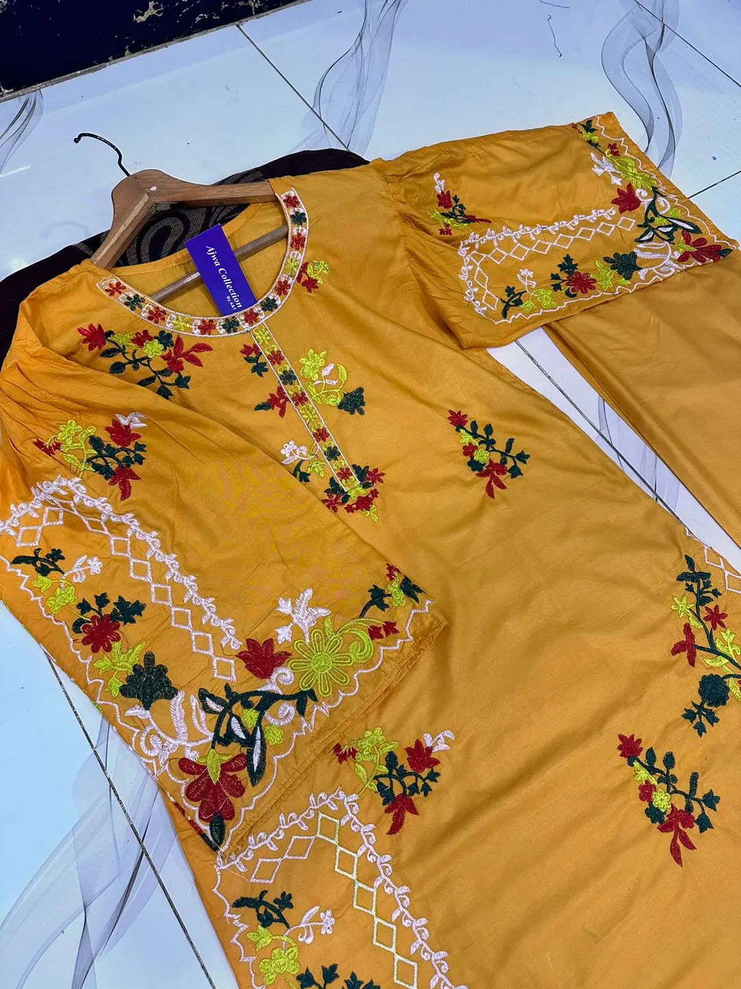 2 Pcs Women's Stitched Linen Embroidered Shirt And Trouser