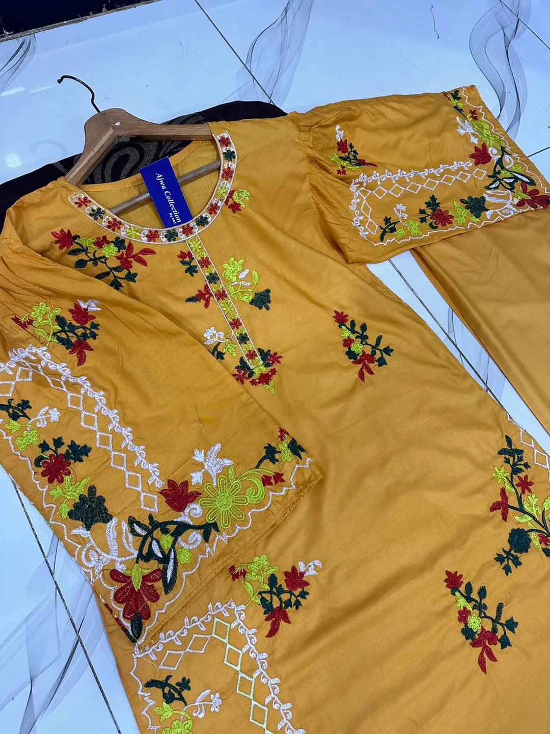 2 Pcs Women's Stitched Linen Embroidered Shirt And Trouser