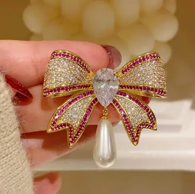 Gold Bow Brooch with Crystal & Pearl Accents