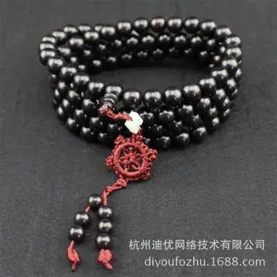 Elegant Multi-Layer Ebony Rosary with Red Macrame Tassel