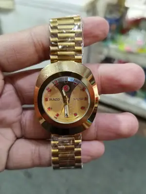 New stylish Rado watch from men golden colour