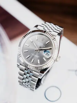 Rolex Watch   Silver dial with light black dial