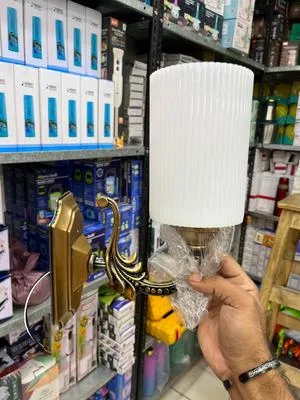 White Ribbed Wall Lamp with Brass Bracket for Home Office