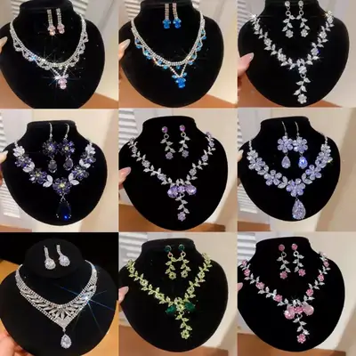 European and American style, featuring diamond-studded teardrop and geometric earrings and a necklace set, with a retro, courtly aesthetic, making it a fashionable and versatile accessory for women
