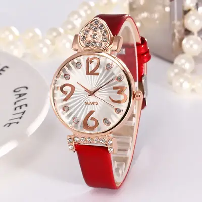 Women's Gold Shell Quartz Watch with Diamond Heart Design