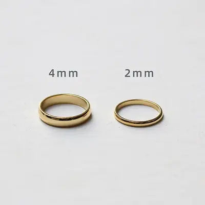 Women's Curved Glossy Titanium Ring with Gold Plating