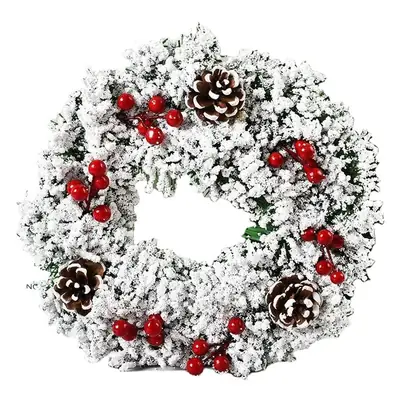 Christmas Wreath Decorated with Pinecones and Red Berries
