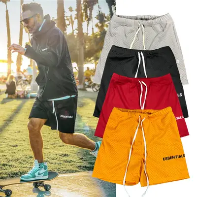Men's White Mesh Fitness Shorts with "Essentials" Print