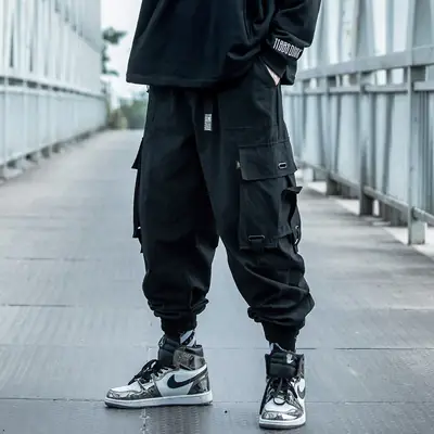 Men Black Cargo Pants with High-Tech Sneakers
